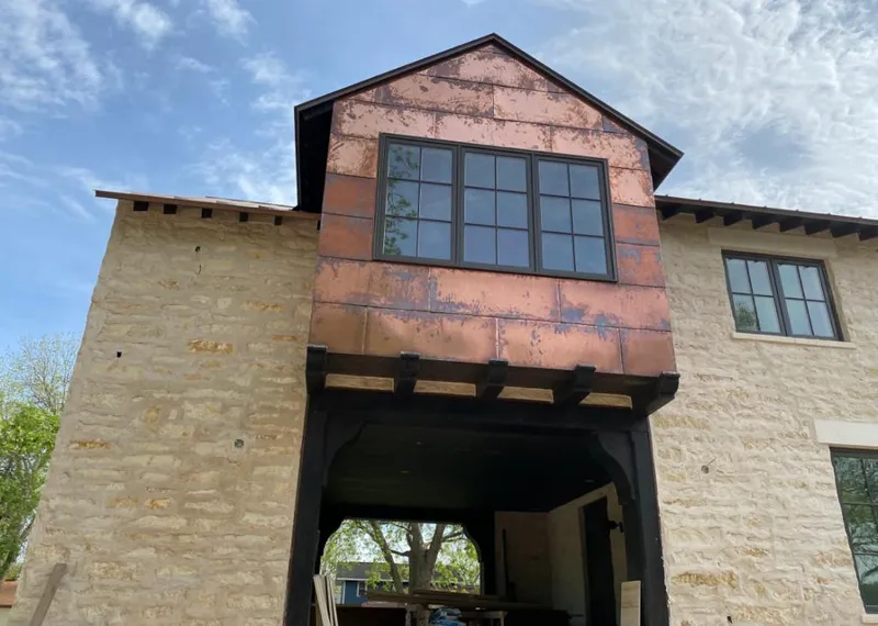 Copper metal panel facade on a stone building for Metal Roof Coating in Millbrae