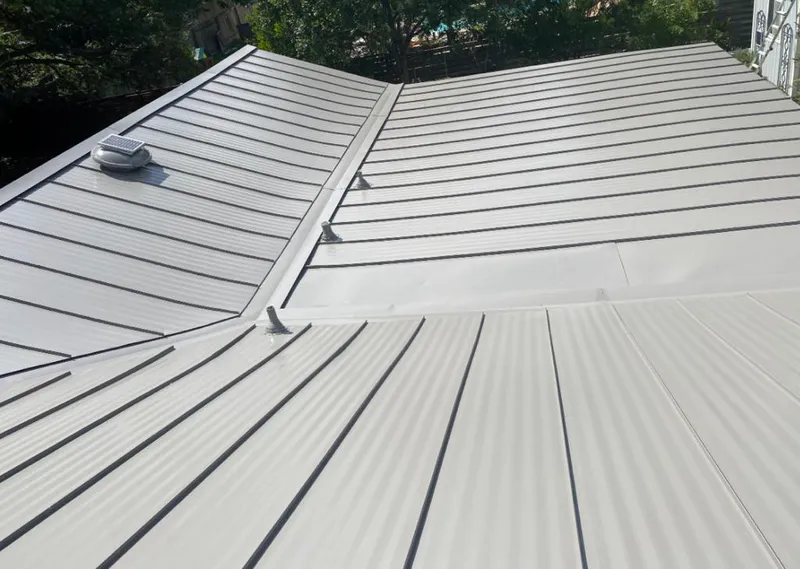 Solar attic fan installed on a metal roof for Roof Ventilation in Millbrae
